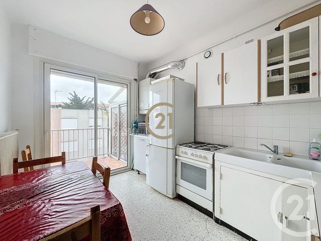 Afficher la photo en grand Appartement F4 à vendre - 4 pièces - 79.76 m2 - SETE - 34 - LANGUEDOC-ROUSSILLON - Century 21 Agence Des Halles